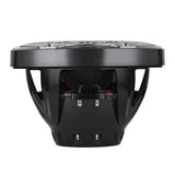 Side profile of a black speaker showing its open basket, terminals and carbon-fiber-patterned rim