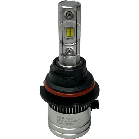 The Lumi LUMI Stage 2 9004 LED headlight bulb features a silver body and a black and red plastic base, labeled â€œV8S Focus LED HEADLIGHT EMC 2022B,â€ and is equipped with advanced CSP chips for superior brightness, displayed against a plain white background.
