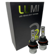 Two LUMI Stage 2 9004 LED Headlight Bulbs by Lumi are displayed in front of a black box labeled â€œLUMI LED Headlight Systems 2.â€ The bulbs have a metallic finish with prominent yellow CSP chips, delivering bright 6000K light for enhanced visibility.