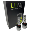 Two Lumi Stage 2 9005 LED Headlight Bulbs with advanced CSP chips are displayed in front of a black box labeled â€œLUMI LED Headlight Systems 2 Stage II Headlight Kitâ€ on a plain background. Each bulb delivers an impressive 6000 lumens, ensuring bright and efficient illumination.