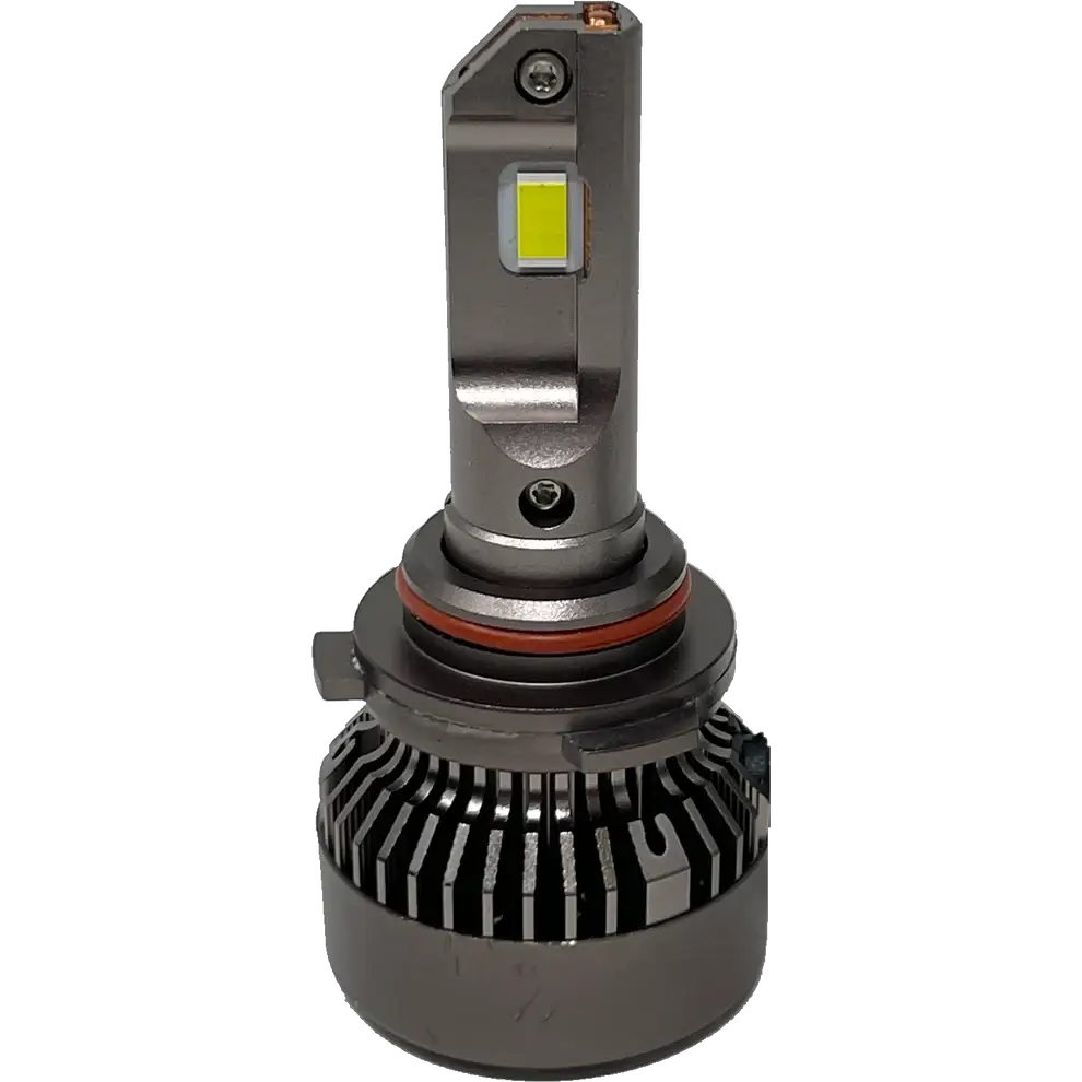 A close-up of a Lumi LUMI Stage 3 9006 LED headlight bulb featuring a 6000K color temperature, metallic base, integrated cooling fins, and a rectangular yellow CSP chip mounted on a silver vertical structure.
