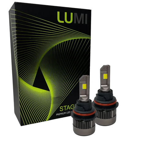 Two LUMI Stage 3 9007 LED Headlight Bulbs with advanced CSP chips and a bright 6000K color temperature are shown in front of a black Lumi box accented with green lines and the text â€œSTAGE PREMIUM LED.â€.