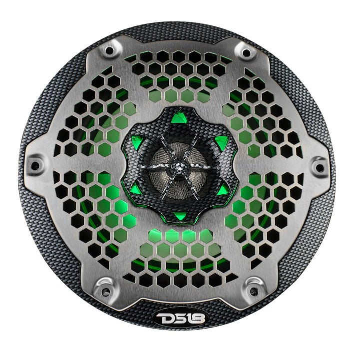 Front view of a carbon-fiber-pattern DS18 speaker with silver honeycomb grille and green illumination