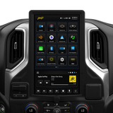 Tall Stinger touchscreen installed between dashboard vents, showing app icons above Apple CarPlay music controls