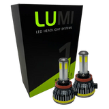 Two LUMI Stage 1 H11 LED Headlight Bulbs by Lumi, each delivering 40 watts of power with a sharp 6000K color temperature and advanced LED CANBUS compatibility, are displayed in front of a black and green box labeled â€œLUMI LED Headlight Systems.â€.