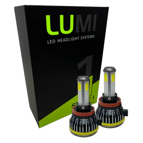 Two LUMI Stage 1 H11 LED Headlight Bulbs by Lumi, each delivering 40 watts of power with a sharp 6000K color temperature and advanced LED CANBUS compatibility, are displayed in front of a black and green box labeled â€œLUMI LED Headlight Systems.â€.