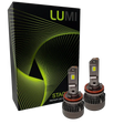 Two LUMI Stage 3 H11 LED headlight bulbs from Lumi, featuring advanced CSP chips, are displayed in front of a black box with green wavy lines and the words â€œSTACKâ€ and â€œPremium LED Headlightsâ€ on the packaging, emphasizing their impressive 6000K brightness for superior visibility.
