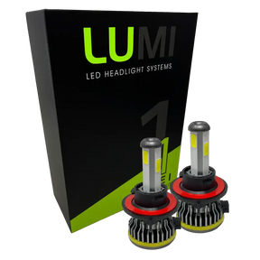 Two LUMI Stage 1 H13 LED headlight bulbs from Lumi, each rated at 40 Watts and featuring red and black heat sinks, are displayed in front of a black and green box labeled â€œLUMI LED Headlight Systems.â€ These bulbs offer a bright 6000K color temperature and include advanced LED CANBUS technology for enhanced compatibility.