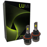 Two LUMI Stage 3 H13 LED headlight bulbs featuring advanced CSP chips are displayed in front of a black Lumi-branded box with green lines and patterns. The bulbs have metallic bases and visible yellow LED chips, delivering brilliant 6000K illumination for superior visibility.