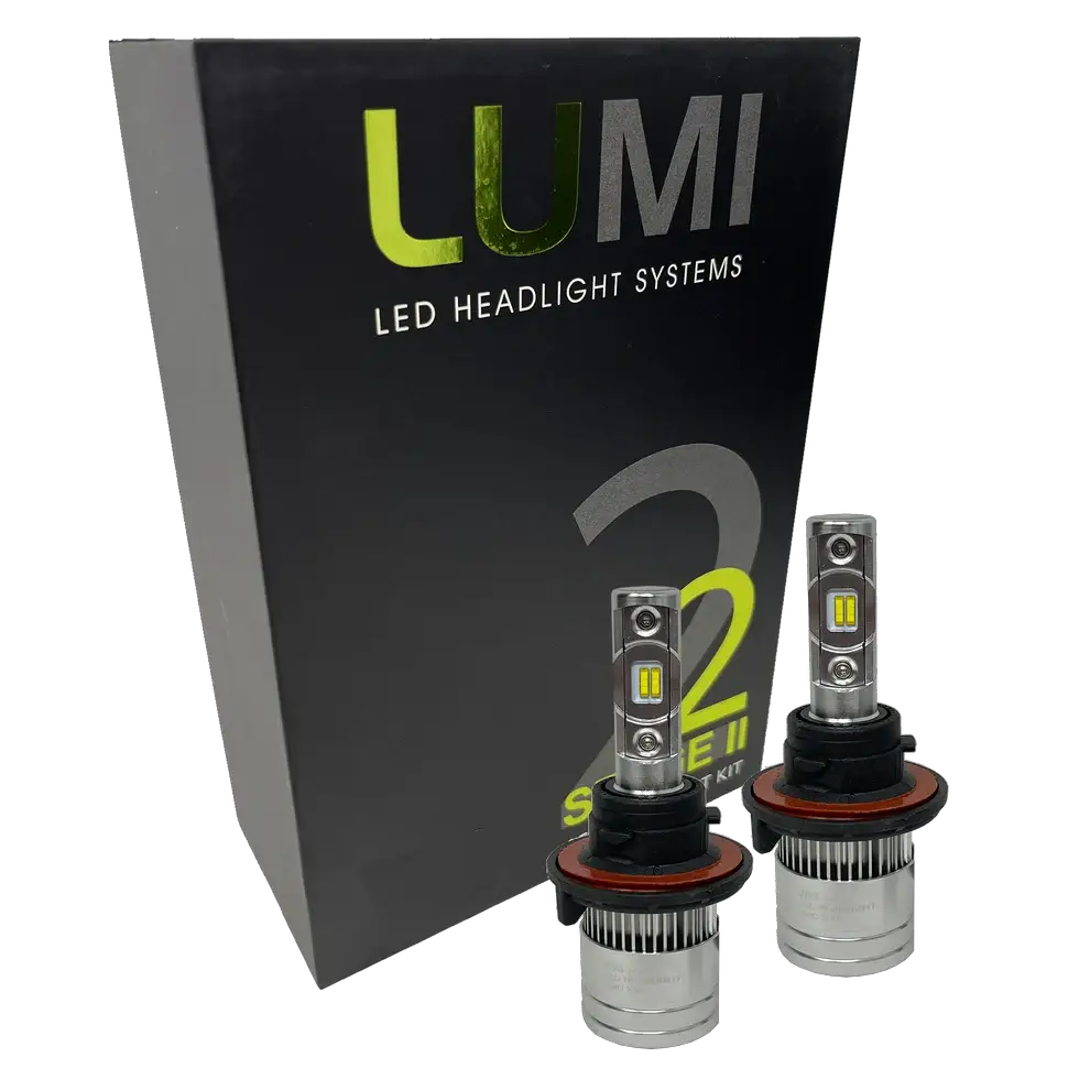 Two LUMI Stage 2 H13 LED Headlight Bulbs by Lumi, featuring advanced CSP chips, are displayed in front of a black box labeled â€œLUMI LED Headlight Systems 2 Stage II Series Kit.â€.