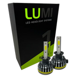 Two LUMI Stage 1 H1 LED Headlight Bulbs are displayed in front of a black and green Lumi box labeled â€œStage 1 LED Headlight Kit,â€ featuring a powerful 40-watt output and a crisp 6000K color temperature for superior visibility.