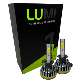 Two LUMI Stage 1 H1 LED Headlight Bulbs are displayed in front of a black and green Lumi box labeled â€œStage 1 LED Headlight Kit,â€ featuring a powerful 40-watt output and a crisp 6000K color temperature for superior visibility.