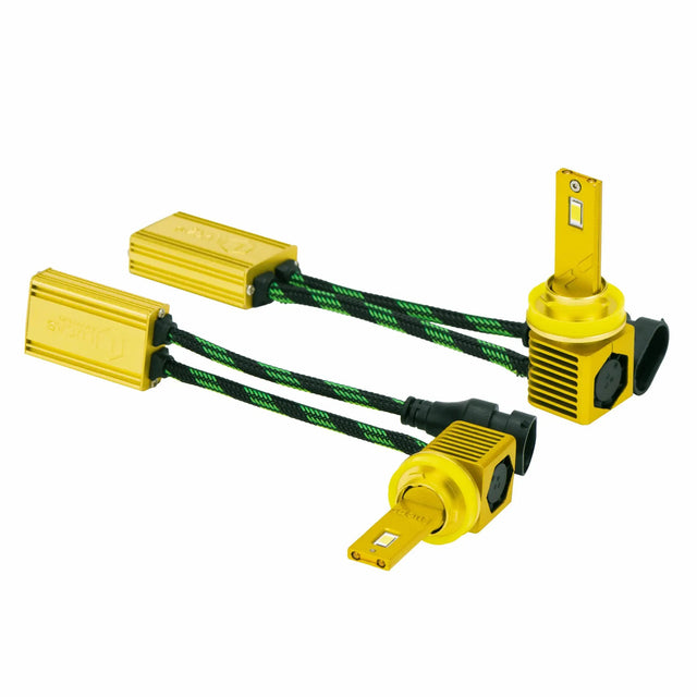 Pair of gold LED bulbs with square finned bases, braided leads and matching gold driver modules