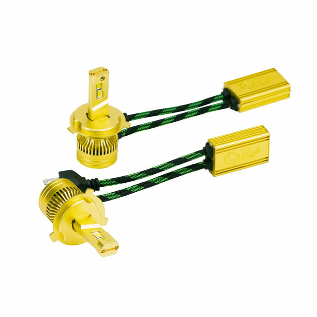 Pair of gold LED bulbs with finned round bases, metal mounting flanges and braided driver leads
