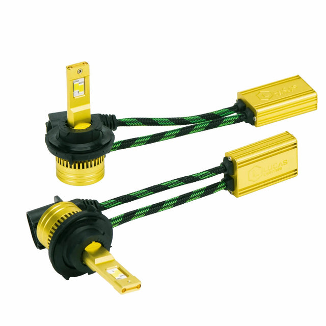 Pair of gold LED bulbs with black mounting collars, finned bases and braided driver leads