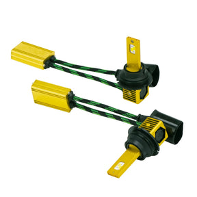 Two gold-colored LED bulbs with black collars and large black connectors, attached to rectangular inline modules