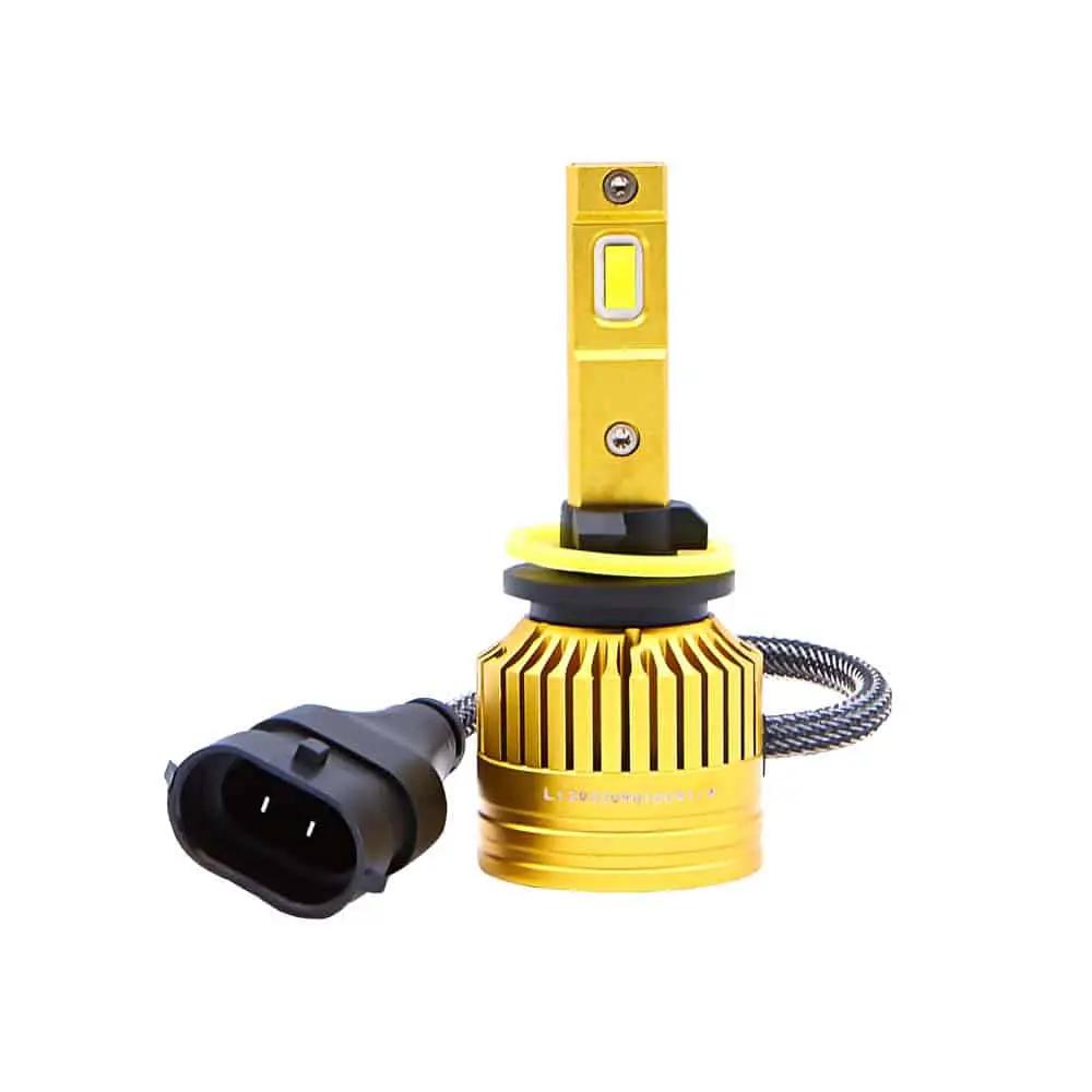 Gold-colored LED bulb with a finned base, black mounting collar and a wired two-pin plug