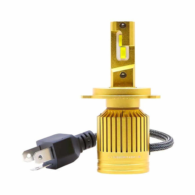 Single gold Lucas LED headlight bulb with a mounting flange, finned base and black plug