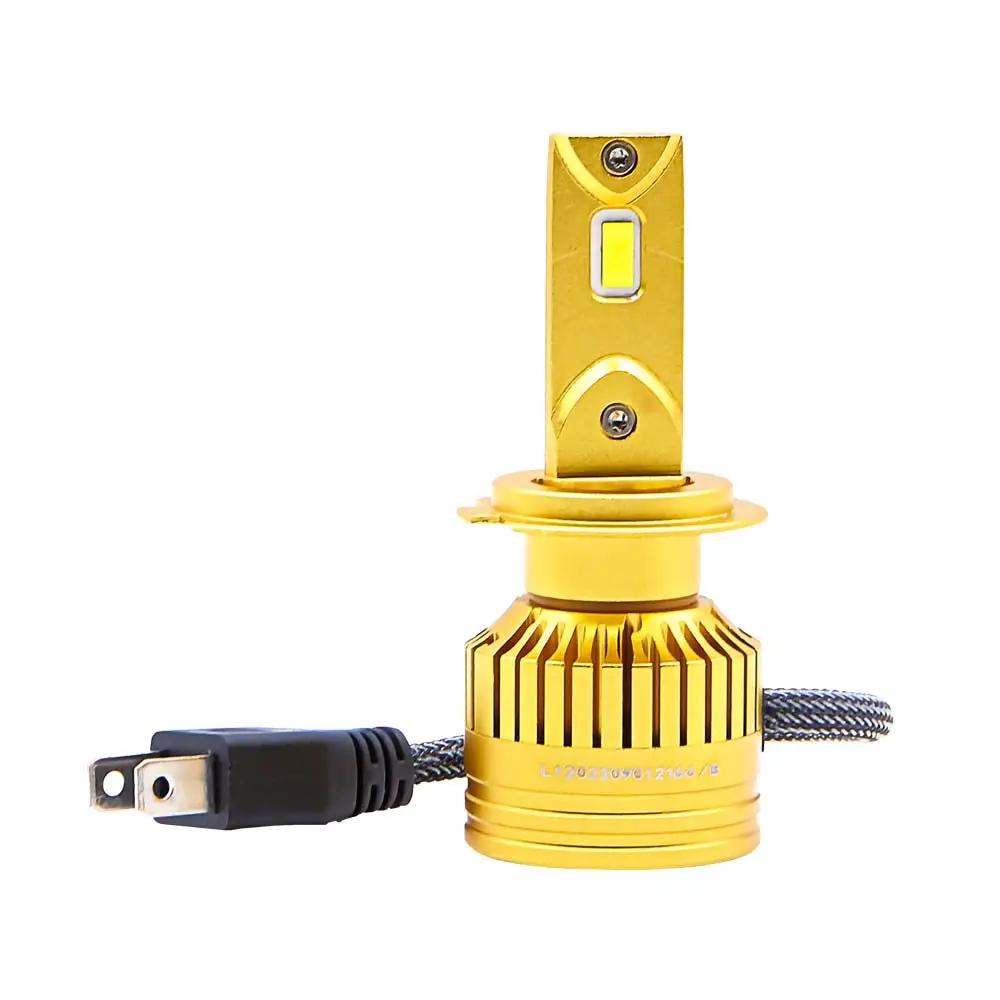 Single gold Lucas LED headlight bulb with a finned base and two-prong connector