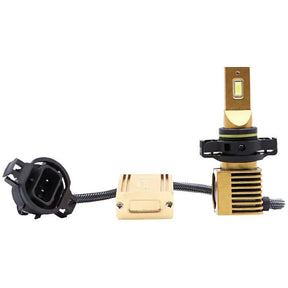 Gold-colored LED bulb with a finned base, inline driver module and black connector on a braided lead