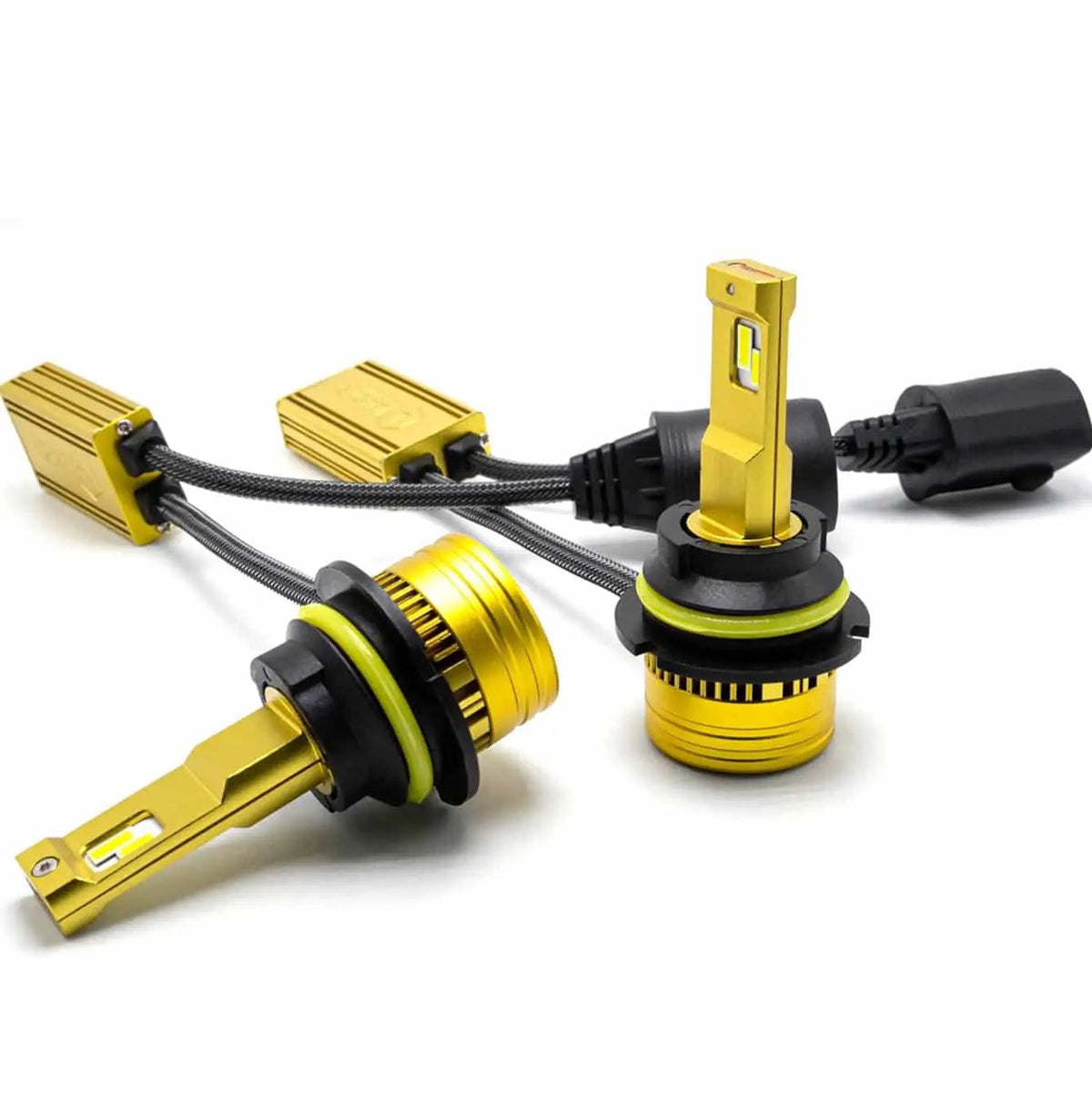 Two gold-colored LED bulbs with black collars and yellow rings, connected to rectangular modules by braided leads