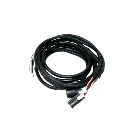 Coiled speaker wiring harness with plug connectors and exposed wire ends