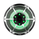 Front of a black DS18 marine speaker with silver honeycomb grille and green illumination