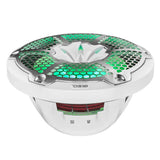 Low angled view of a white DS18 speaker with green lighting, a silver honeycomb grille and red suspension visible through the basket.