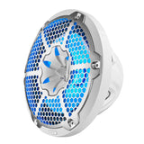 Angled view of a white DS18 speaker with a silver honeycomb grille, sculpted central tweeter and blue lighting.