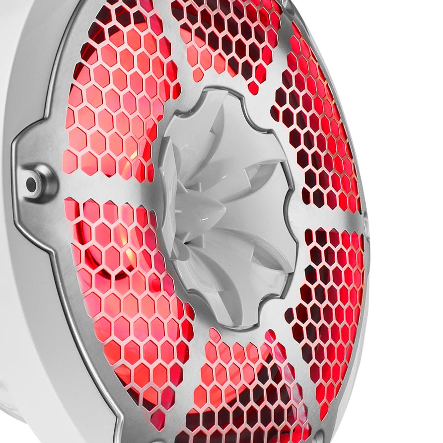 Close-up of a white DS18 speaker's honeycomb grille and central tweeter with red illumination