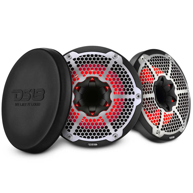 Two black DS18 speakers with silver honeycomb grilles and red lighting beside a protective cover