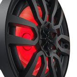 Close-up of a black speaker's grille and central tweeter with red lighting behind the cone