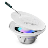 A bent-tip tool lifting the perforated white grille from an illuminated speaker
