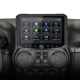Stinger touchscreen installed above round dashboard vents, showing radio, media, navigation and settings icons