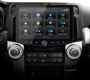 Stinger touchscreen installed above two large climate-control knobs, displaying its source-selection menu