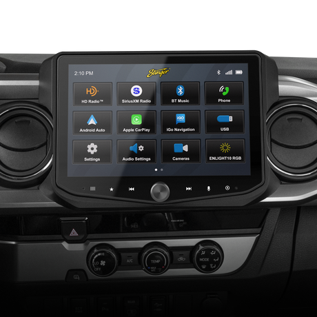 Stinger touchscreen installed between round dashboard vents, displaying radio, media, navigation and settings icons