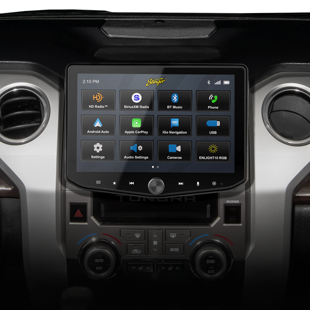 Stinger touchscreen installed above the dashboard climate controls, displaying its source-selection menu