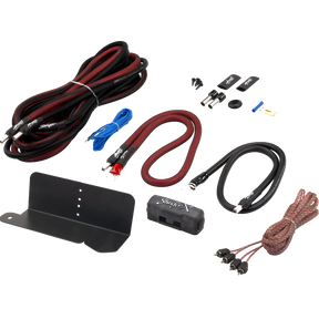 Collection of car audio components including cables and connectors on a white background