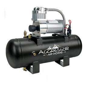 Aggressor air compressor mounted on a black tank