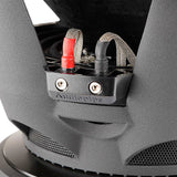 Close-up of an Audiopipe subwoofer terminal block, red and black braided leads and vented basket