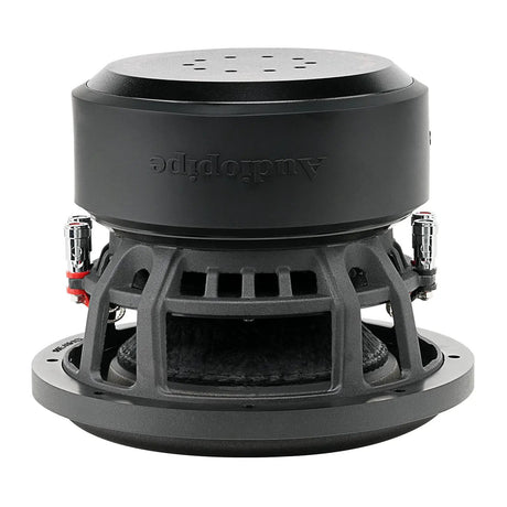 Inverted side view of a black subwoofer showing its magnet cover, open basket and silver terminals