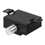 Angled view of black amplifier remote with silver knob and ventilated side panel