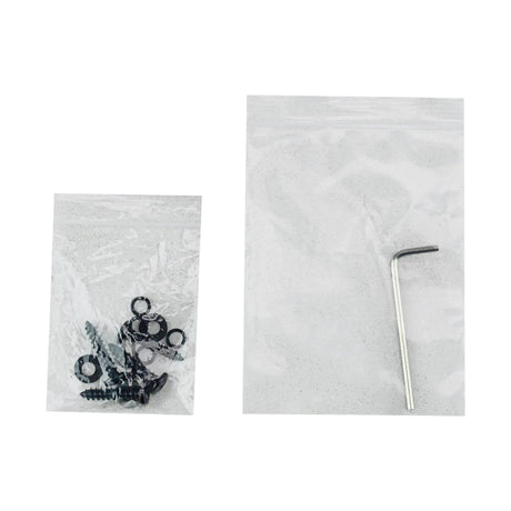 Bags of amplifier mounting screws and washers beside an Allen key
