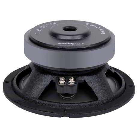 Rear angled view of a compact black woofer showing its gray magnet, open basket and two screw terminals