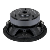Rear angled view of a black woofer showing its gray magnet, open basket and two terminal blocks