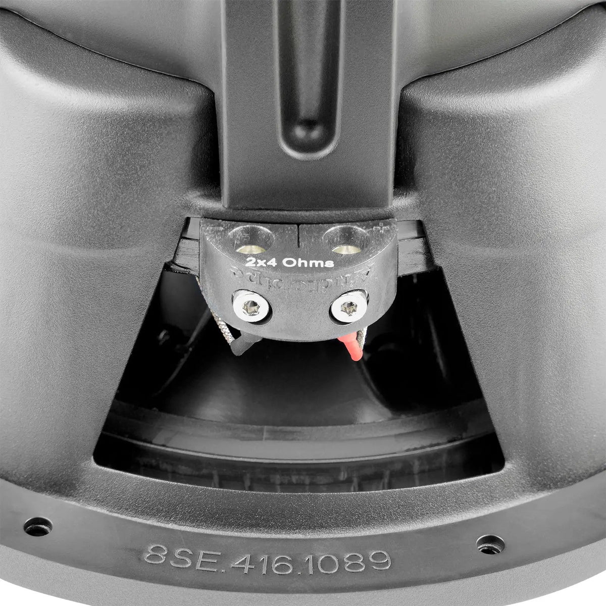 Close-up of an Audiopipe subwoofer terminal block marked 2x4 Ohms
