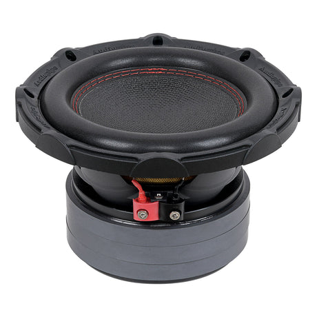 Low-angle Audiopipe subwoofer with red stitching, broad surround and red-and-black terminals