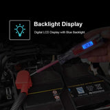 Digital automotive test light at a car battery, demonstrating its blue backlit LCD voltage display