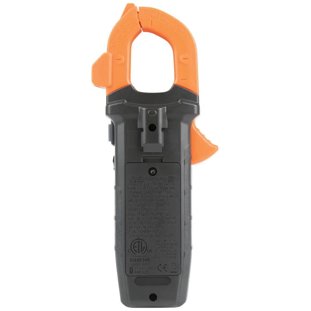 Rear view of a black-and-orange clamp meter showing its battery cover and molded safety markings
