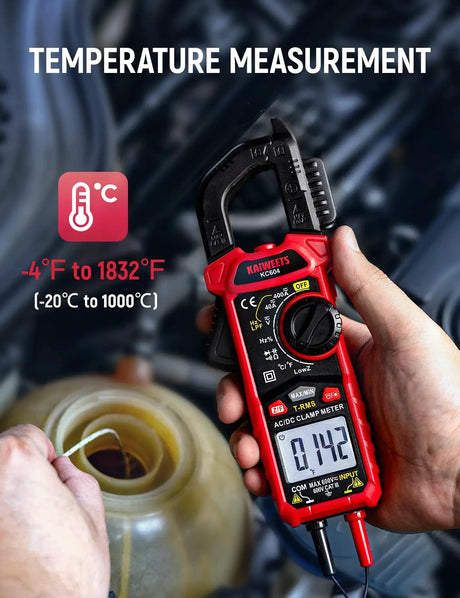 KC604 clamp meter measuring temperature with a probe in a container of liquid